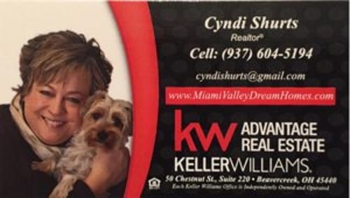 Including a picture of your pet on the real estate business card design