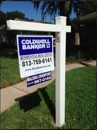Post sign that incorporates the brokerage branding.