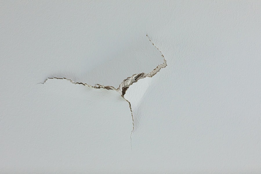 Cracked ceiling caused by the tenant.