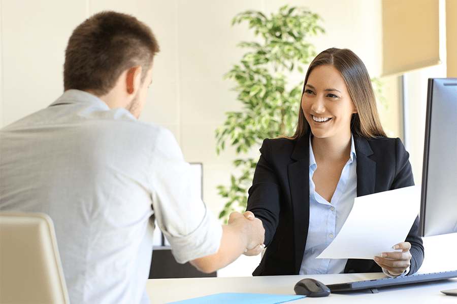 Successful job interview with boss and employee handshaking