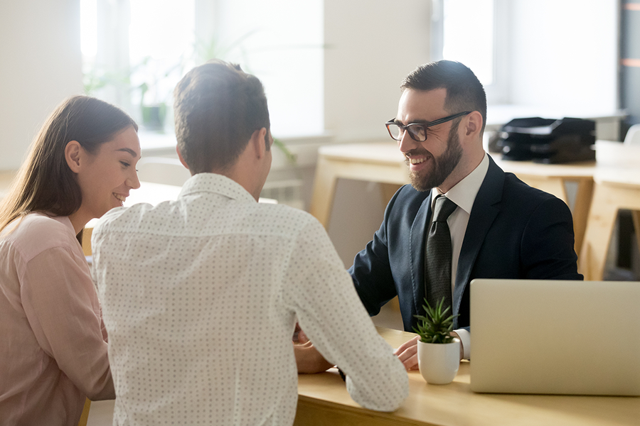 couple talking to a bank manager