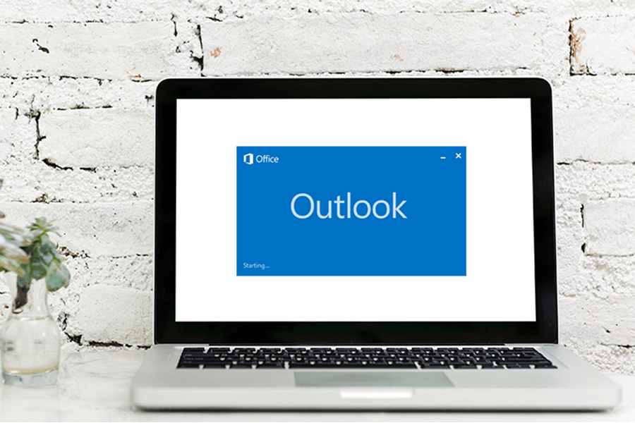 Starting Outlook App on laptop.