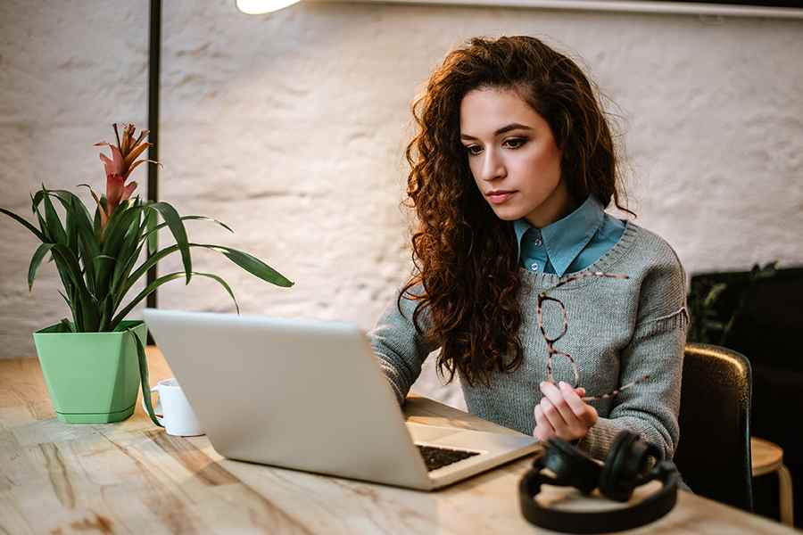 woman taking online class at home