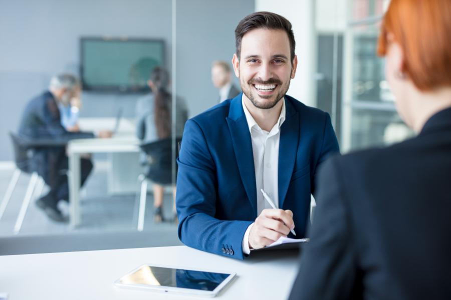 Smiling employee looking at the camera.