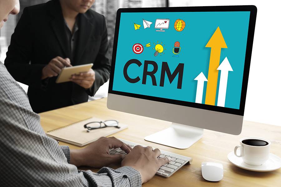 CRM graphic concept on Mac screen