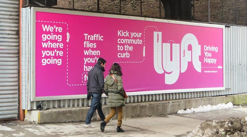 National Company Lyft ads on a billboard in metro area.