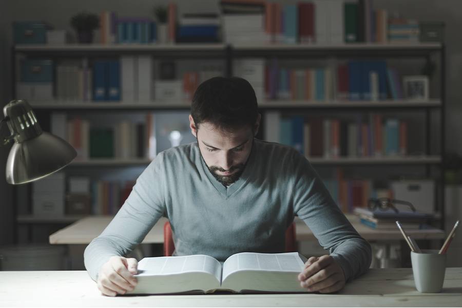 a man studying in the library