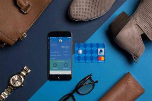 Mobile phone with credit card and other accessories.