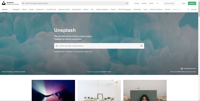 Unsplash landing page where you can search images by keyword or browse by category.