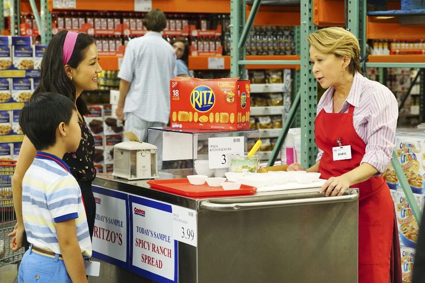 Showing a staff giving free sample of Ritz.