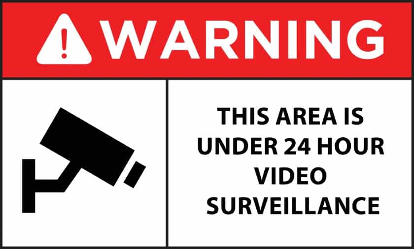 24 hour video surveillance warning sign.