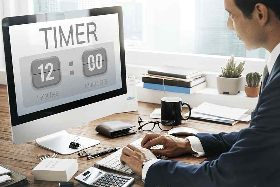 Businessman Working on Time Tracking Software