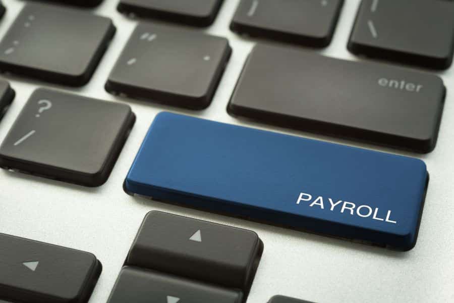 The word Payroll written on a keyboard key.