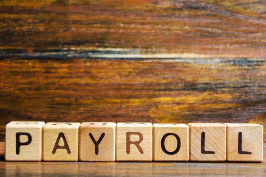 Wooden blocks with the word Payroll