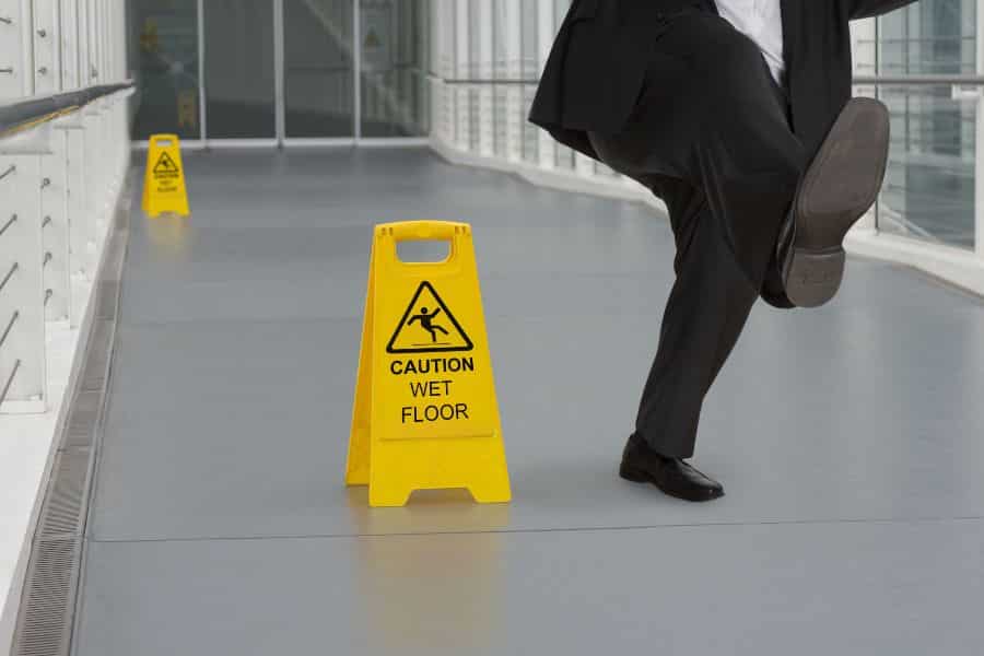 man slipping on a wet floor
