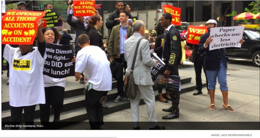 Protesters protesting against Bitcoin company Genesis Mining.