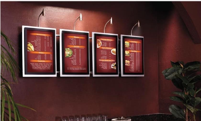 Showing a wall-mounted menu display.