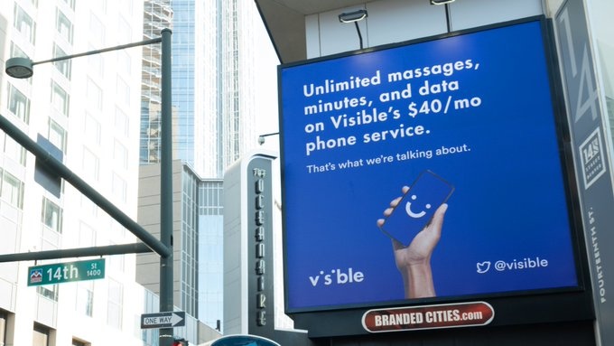 A Visible Mobile billboard with a typo reading "massages" instead of "messages."