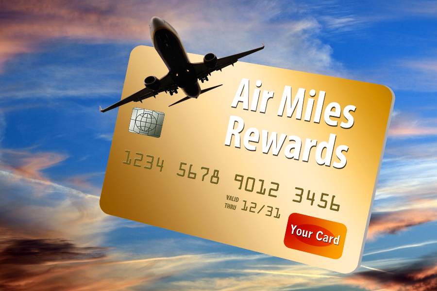 Air Miles Rewards credit card with a silhouette of an airplane infront.