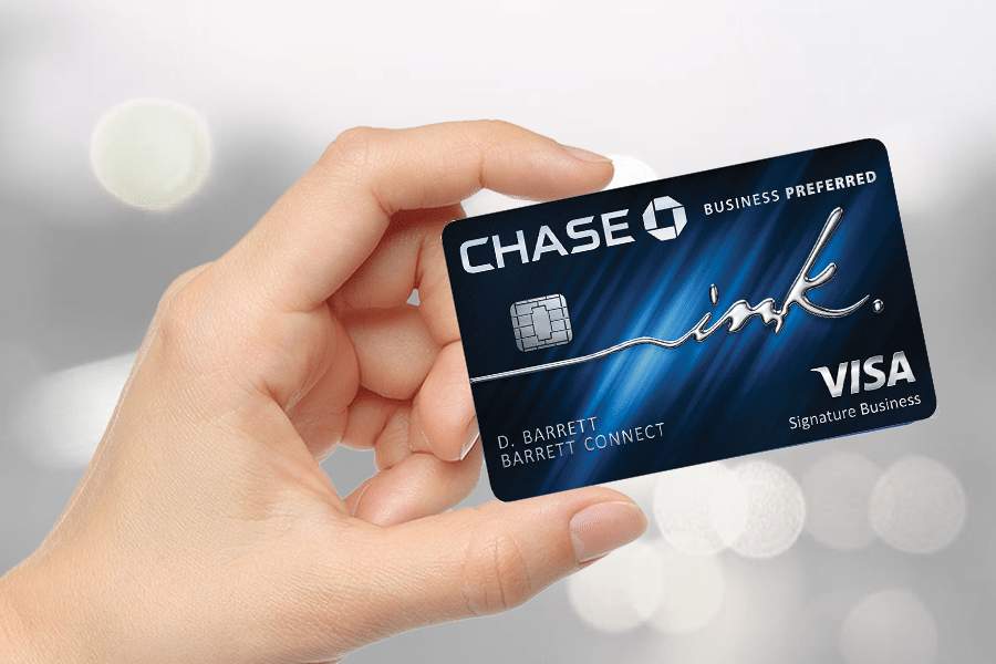 Hand holding Chase Ink Business Preferred Credit Card.