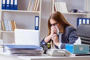 Businesswoman employee sick in the office time policy.