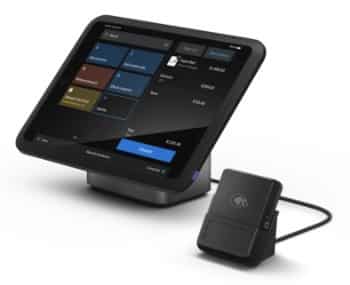 Showing a retail bundle that comes with an iPad stand and a chip and EMV card reader.