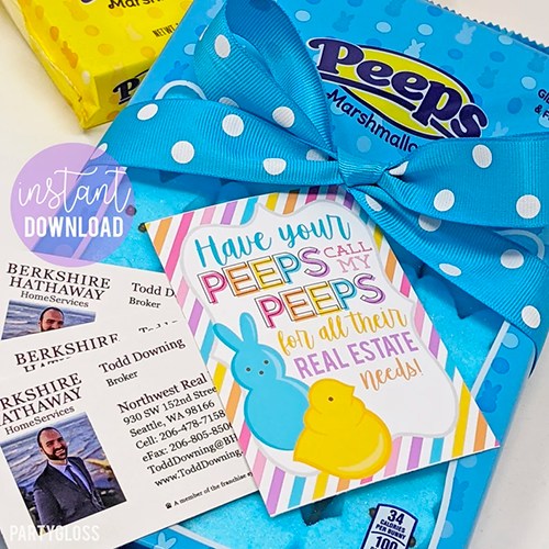 Box of peeps with business card and a card that says "Have your peeps call my peeps for all their real estate needs."