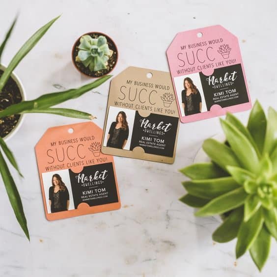 Succulent gift tag with business card attached that says "my business would succ without clients like you"