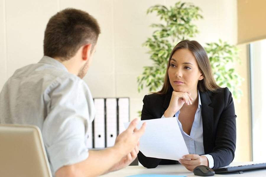 woman interviewing an applicant