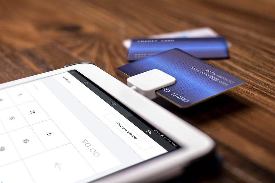 Showing a mobile credit card processing.