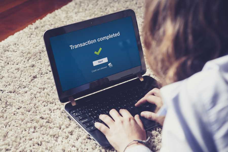 "transaction complete" on computer screen