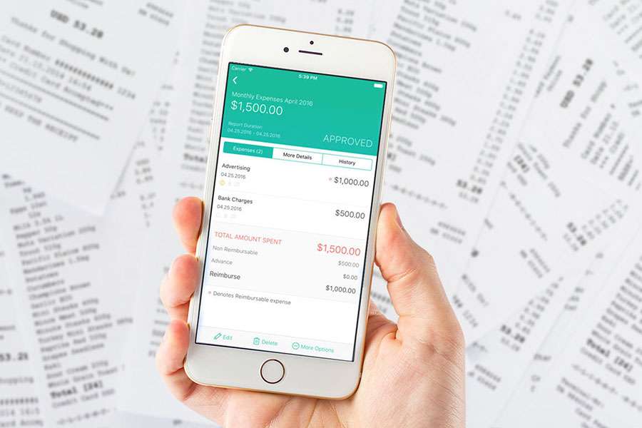 Hand holding a mobile with Business expense tracker.