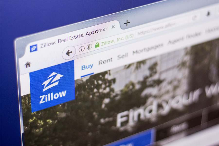 Zillow logo and homepage