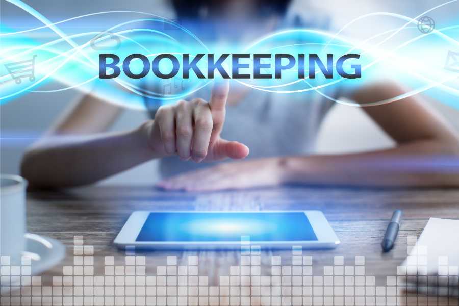 Woman using tablet pc, pressing on virtual screen and selecting bookkeeping