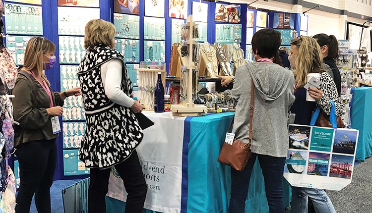 People choose a coastal souvenir product for The Grand Strand Gift and Resort Merchandise Show.