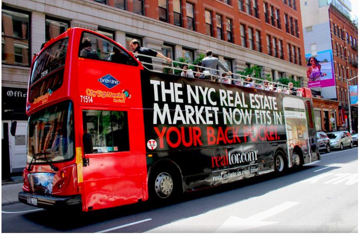 real estate ad on tour bus