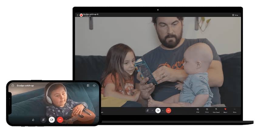 Father with his babies and young girl playing guitar doing video conferencing in laptop and smartphone using Skype.