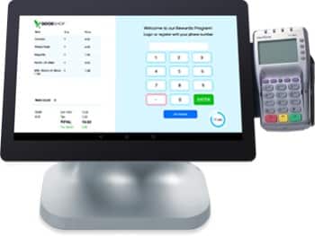 Showing Comcash self-checkout terminal.