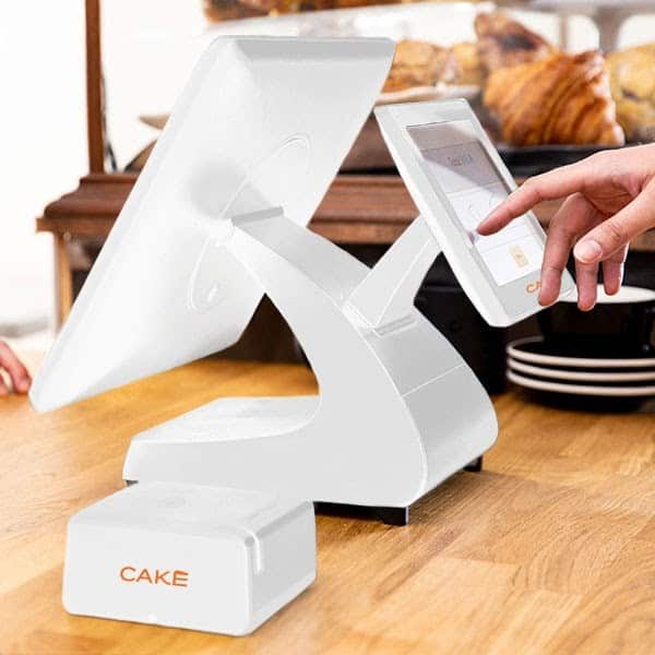 Cake's POS terminals with built-in customer-facing displays are available in white or charcoal colorways.