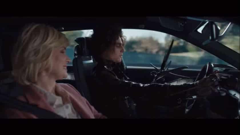 Edgar Scissorhands drives the Cadillac on a TV commercial.