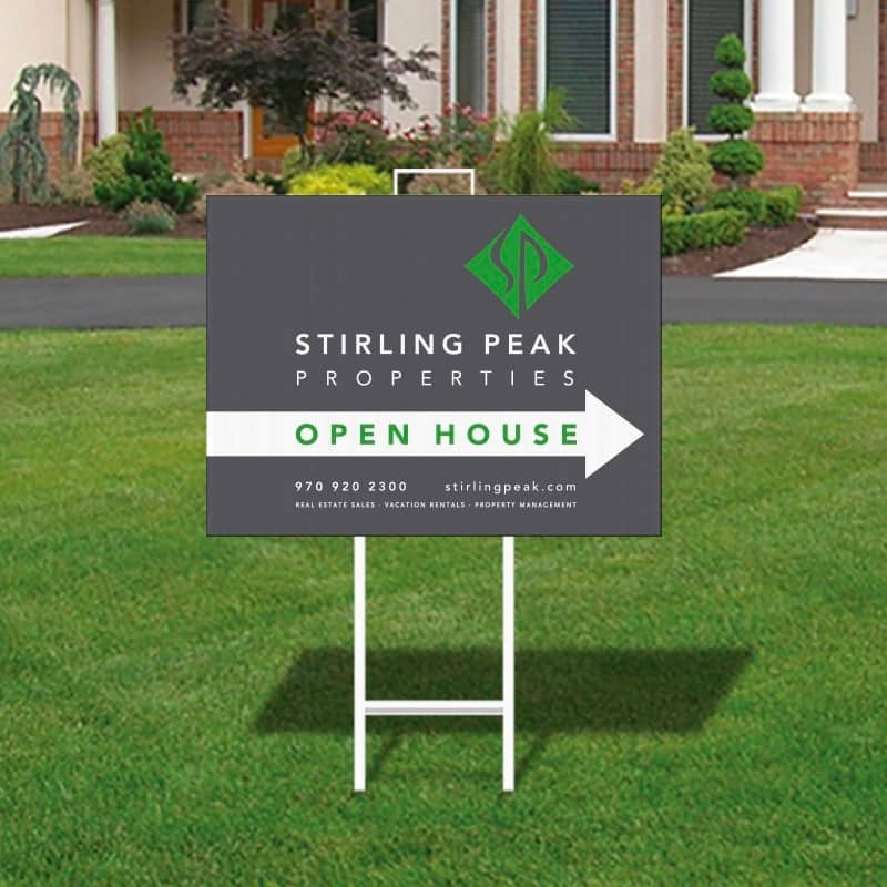 Real Estate Sign with an arrow pointing to the property