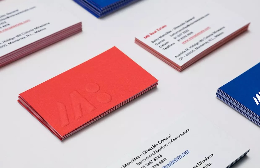 Example of a real estate business card with embossed logo.