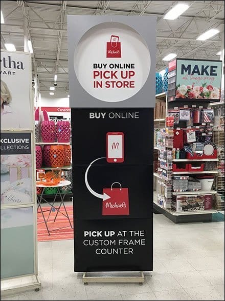 Signage directs BOPIS customers to the frame counter