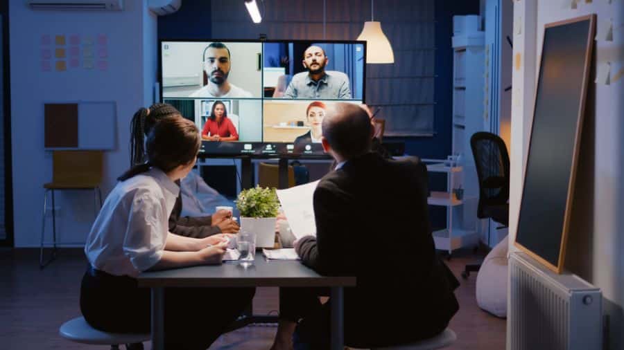 Remote workers doing video conference.