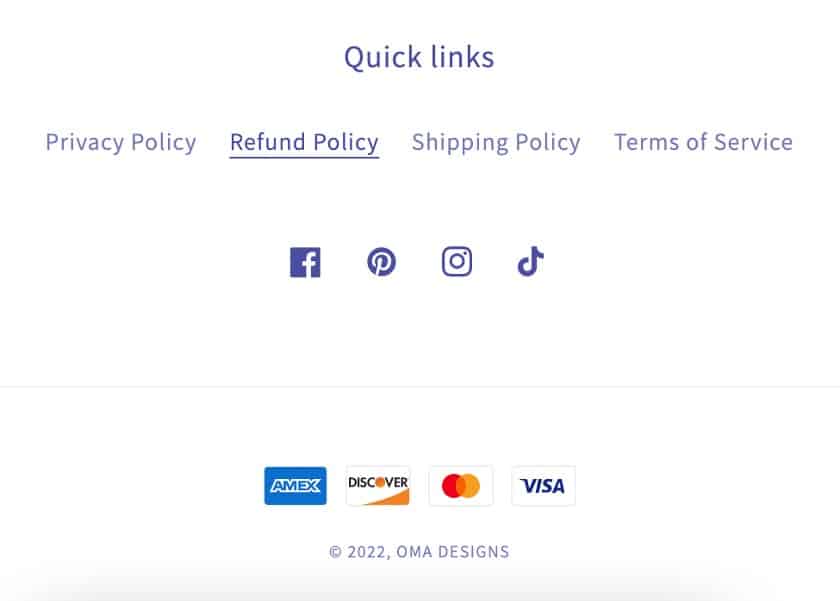 Showing an apparel brand OMA designs refund policy link.