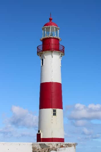 Lighthouse with red and white stripes.