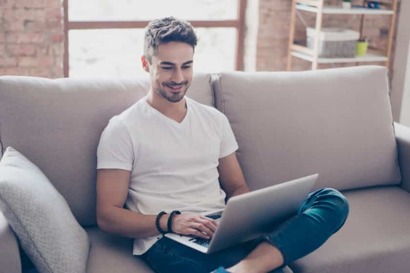 Showing a man wearing short sleeved t-shirt appropriate for the meeting.