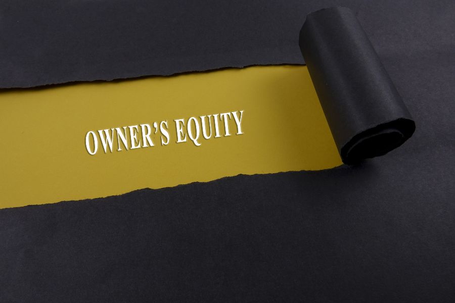 Owner's Equity in a torn paper.