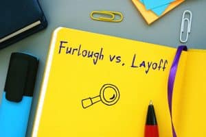 Furlough vs Layoff inscription on the sheet.