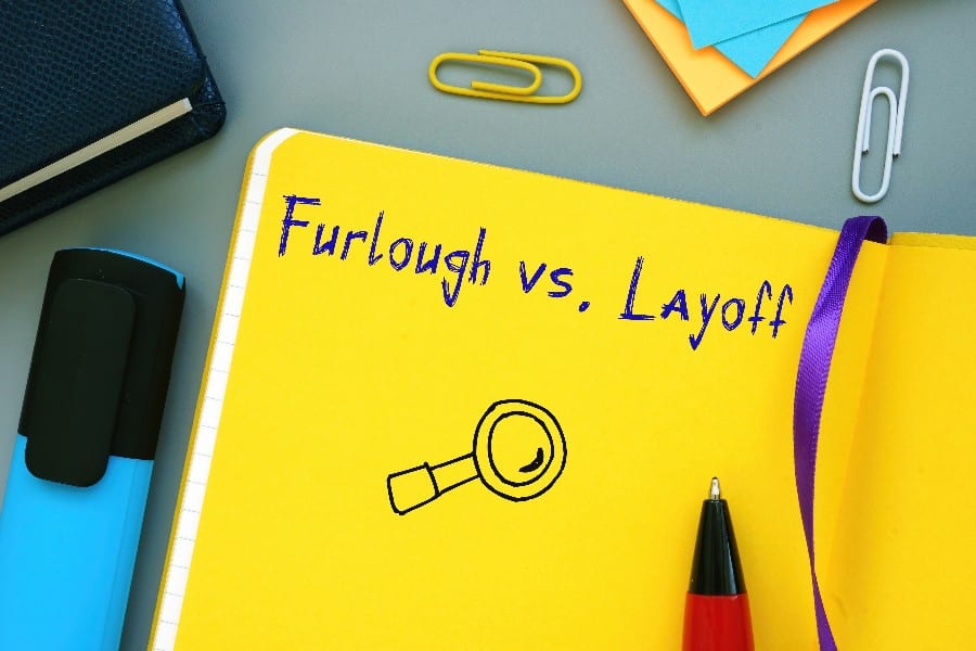 Furlough vs Layoff inscription on the sheet.